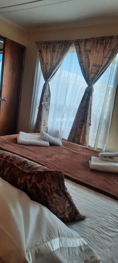 Hostal Los Pinos Пуерто-Наталес Екстер'єр фото