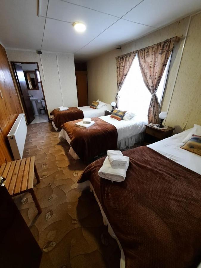 Hostal Los Pinos Пуерто-Наталес Екстер'єр фото