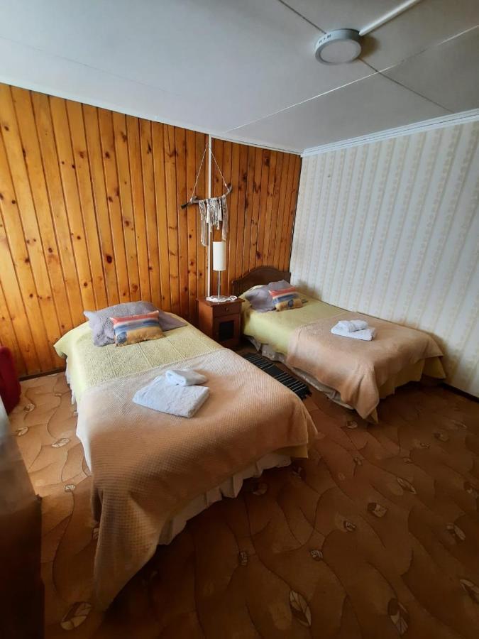 Hostal Los Pinos Пуерто-Наталес Екстер'єр фото
